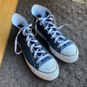 Blue and black converse